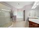 Bright bathroom featuring a walk-in shower, soaking tub, and a double vanity at 6324 Old Fox Hunt Ln, Mint Hill, NC 28227