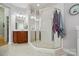 Bathroom featuring a tiled shower with glass doors at 6324 Old Fox Hunt Ln, Mint Hill, NC 28227