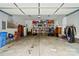 Spacious garage with ample storage shelves and room for multiple vehicles at 6324 Old Fox Hunt Ln, Mint Hill, NC 28227