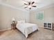 Bedroom with a plush bed, neutral carpet, and natural light from the window at 643 Baron Rd # 8, Waxhaw, NC 28173