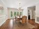 Bright dining room with hardwood floors and access to the outside through french doors at 643 Baron Rd # 8, Waxhaw, NC 28173