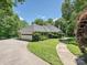 The property features a winding driveway, attached garage, and beautiful landscaping at 643 Baron Rd # 8, Waxhaw, NC 28173