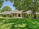 Stunning home with a lush front lawn, mature trees, and a welcoming front entrance and beautiful architecture at 643 Baron Rd # 8, Waxhaw, NC 28173