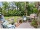 Relaxing back deck with outdoor seating overlooking the spacious backyard at 716 Mooresville Rd, Salisbury, NC 28144