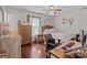 Bright bedroom with hardwood floors, a large dresser, and an office space at 716 Mooresville Rd, Salisbury, NC 28144
