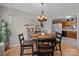 Inviting dining area featuring a round table, decorative light fixture, and neutral wall color at 716 Mooresville Rd, Salisbury, NC 28144