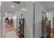 Inviting hallway with shelving and decor leading to the living spaces at 716 Mooresville Rd, Salisbury, NC 28144