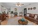 Cozy living room featuring hardwood floors, a decorative fireplace, and comfortable leather seating at 716 Mooresville Rd, Salisbury, NC 28144