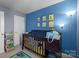 Bright Bedroom with colorful décor, a crib, and fun decorations at 718 Dillon Way # 38, Fort Mill, SC 29715