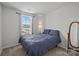 Bedroom featuring neutral walls, carpet floors, and a bed with a large window at 718 Dillon Way # 38, Fort Mill, SC 29715