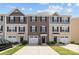 Charming townhome with a well-maintained exterior, a private garage, and a cozy front entrance at 718 Dillon Way # 38, Fort Mill, SC 29715