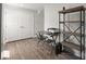 Neutral office area with desk, shelving unit, and door access, perfect for working at home at 718 Dillon Way # 38, Fort Mill, SC 29715