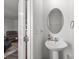 Powder room featuring a pedestal sink, a mirror, and modern fixtures at 718 Dillon Way # 38, Fort Mill, SC 29715