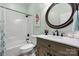 Stylish bathroom featuring neutral colors, framed mirror, and a shower with tub combination at 73 20Th Sw Ave, Hickory, NC 28602