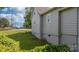 View of a gray home with a green, manicured lawn and street in the background at 73 20Th Sw Ave, Hickory, NC 28602