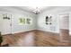 Bright living room featuring hardwood floors, a large window, and stylish details at 73 20Th Sw Ave, Hickory, NC 28602