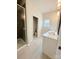 Bathroom featuring double vanity sinks and an open glass walk-in shower at 734 Herlong Ave, Rock Hill, SC 29732