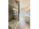 Bathroom showcasing an open glass walk-in shower with double vanity sinks at 734 Herlong Ave, Rock Hill, SC 29732