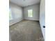 Bright bedroom with natural light and neutral carpeting at 734 Herlong Ave, Rock Hill, SC 29732