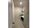 Functional laundry room includes washer, dryer, and convenient shelving at 734 Herlong Ave, Rock Hill, SC 29732