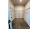A spacious walk-in closet with carpeted floors at 734 Herlong Ave, Rock Hill, SC 29732