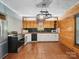 Renovated kitchen with butcher block counters, modern appliances, and ample cabinet space at 828 N Main St, Mount Pleasant, NC 28124