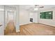 Bedroom featuring hardwood floors, natural light, and an attached bathroom at 8338 Rittenhouse Cir, Charlotte, NC 28270