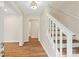 Open hallway with natural lighting and hardwood floors at 8338 Rittenhouse Cir, Charlotte, NC 28270