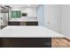 Bright kitchen with stainless steel appliances, contrasting cabinets, and an island at 8338 Rittenhouse Cir, Charlotte, NC 28270