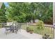 Outdoor deck with furniture and plants, offering a relaxing space at 9004 Lauriston Pl, Mint Hill, NC 28227