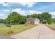 Inviting two-story brick home with an attached two car garage and long driveway at 9004 Lauriston Pl, Mint Hill, NC 28227