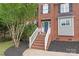 Charming brick stairway leading to a front door with beautiful landscaping at 9004 Lauriston Pl, Mint Hill, NC 28227