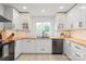 Modern kitchen featuring stainless steel appliances and bright white cabinets and counters at 9004 Lauriston Pl, Mint Hill, NC 28227