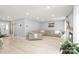 Bright living room featuring recessed lighting, a fireplace, and stylish light-colored wood flooring at 9004 Lauriston Pl, Mint Hill, NC 28227