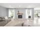 Bright living room featuring recessed lighting and a fireplace with a wooden mantle at 9004 Lauriston Pl, Mint Hill, NC 28227