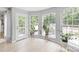 Sun room with wood flooring, bright natural light, and views of the outdoors at 9004 Lauriston Pl, Mint Hill, NC 28227