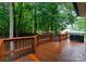 Expansive backyard deck with wood railings and ample space for outdoor furniture and grilling at 901 Brighton Dr, Kannapolis, NC 28081