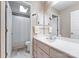 Bathroom with a single sink vanity, plenty of cabinet space, and a skylight over the shower at 901 Brighton Dr, Kannapolis, NC 28081