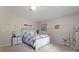Cozy bedroom featuring carpet floors, a nautical themed bed set and tasteful decorations at 901 Brighton Dr, Kannapolis, NC 28081