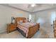 Bright bedroom with vaulted ceilings, wood furniture, ceiling fan and carpeted floors at 901 Brighton Dr, Kannapolis, NC 28081