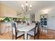 Bright dining area featuring hardwood floors, chandelier lighting, and a china cabinet with plenty of room at 901 Brighton Dr, Kannapolis, NC 28081
