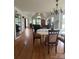 Spacious dining area with hardwood floors, vaulted ceilings, and a view into the adjacent living space at 901 Brighton Dr, Kannapolis, NC 28081
