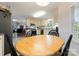 Eat in kitchen with black chairs and a view into the living area at 901 Brighton Dr, Kannapolis, NC 28081