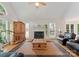 Charming living room featuring hardwood floors, fireplace and vaulted ceilings for added space and comfort at 901 Brighton Dr, Kannapolis, NC 28081