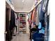 Walk-in closet with built-in shelves and plenty of room for storage at 901 Brighton Dr, Kannapolis, NC 28081