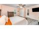 Comfortable main bedroom featuring a cozy bed with bright accents, a spacious closet, and soft, neutral walls at 910 W A St, Kannapolis, NC 28081