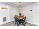 Cozy dining area featuring a round wooden table and black spindle chairs, perfect for casual meals at 910 W A St, Kannapolis, NC 28081