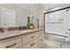 Tastefully updated bathroom with granite counters, modern cabinets, and a combination tub and shower at 9125 Dylan Ridge Ct, Concord, NC 28027