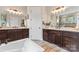 Beautiful bathroom with double vanity, granite countertops and tile flooring at 9125 Dylan Ridge Ct, Concord, NC 28027