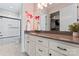 Bathroom with granite counters, modern cabinets, walk-in closet, and combination tub and shower at 9125 Dylan Ridge Ct, Concord, NC 28027